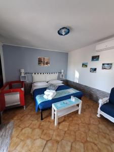 Ένα ή περισσότερα κρεβάτια σε δωμάτιο στο Agriturismo Pira Pinta