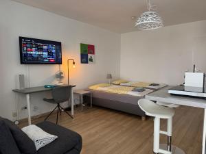 En eller flere senge i et værelse på Altstadtoase an der Marientormauer