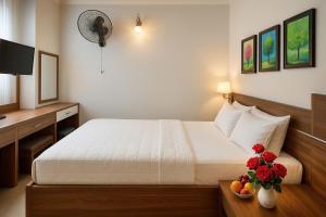 Postel nebo postele na pokoji v ubytování Noi Bai Sunflower Hotel + 19 fotografií