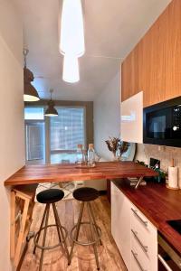 Kuchyň nebo kuchyňský kout v ubytování Classy Central airport apartment