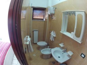 Koupelna v ubytování Hotel Aurora