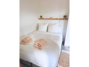 Ένα ή περισσότερα κρεβάτια σε δωμάτιο στο Studio Cosy Au Centre d'Evry