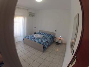 Postel nebo postele na pokoji v ubytování Hotel Aurora