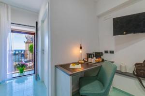 TV a/nebo společenská místnost v ubytování Torre del Pardo Guest House
