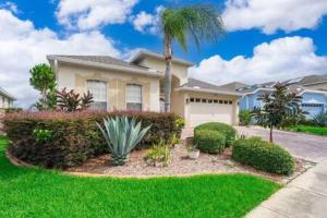 a house with a palm tree in a yard at Unique comfortable Golf course Home w Private Pool in Davenport