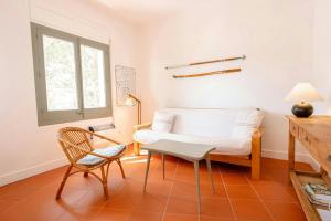 Posezení v ubytování T4 · Beachside escape with unbeatable views