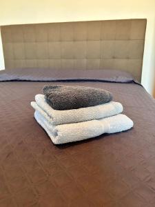 En eller flere senge i et værelse på Attico + 16 billeder