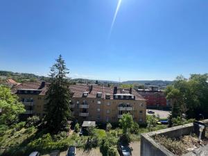 a view of an apartment complex from a building at Sonnenblick Balkon Apt Netflix in Saarbrücken