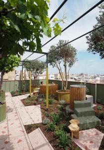 a garden on the roof of a building at Hotel Casa Bonay & Spa in Barcelona