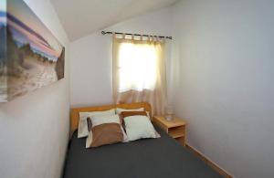 Postel nebo postele na pokoji v ubytování Holiday house Casa Nostra