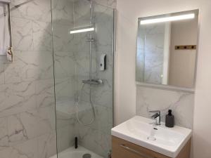 Koupelna v ubytování Appartement cosy aux portes du Touquet Paris Plage + 21 fotografií