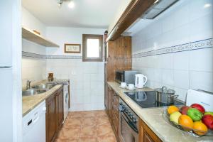 Kuchyň nebo kuchyňský kout v ubytování Villa Can Canaveret by Villa Plus