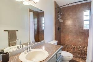 a bathroom with a sink and a toilet and a shower at Long Beach Maple House in Long Beach +14 photos