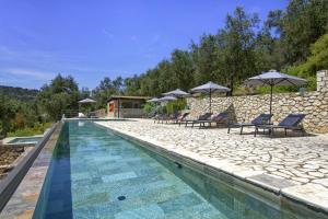 Bazén v ubytování Paxoi Resort - Adult-Only nebo v jeho okolí