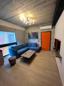 TV a/nebo společenská místnost v ubytování Al Amine 501 - 1-BR Mar Mikhael