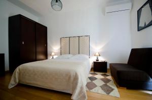 Uma cama ou camas num quarto em Casa da Ladeira, Turismo Rural