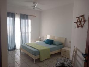 Postel nebo postele na pokoji v ubytování Vilas Praia de Chaves SEA VIEW sol y mar