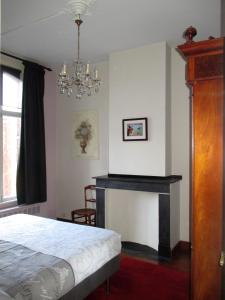 Apartments Suites in Antwerp 객실 침대
