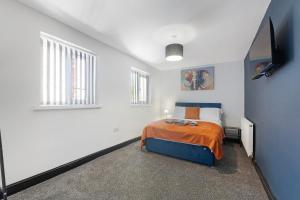 Postel nebo postele na pokoji v ubytování New 4BR in Station Road