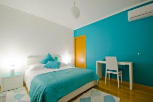 Uma cama ou camas num quarto em Casa da Ladeira, Turismo Rural