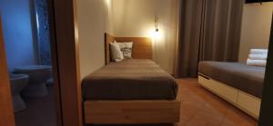 Postel nebo postele na pokoji v ubytování Casa Duci