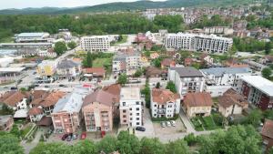 an aerial view of a town with buildings at Rose casa apartments Vrnjacka Banja in Vrnjci