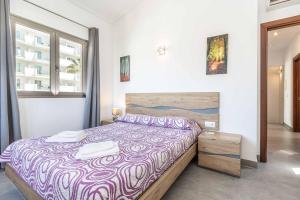 Postel nebo postele na pokoji v ubytování Villa Albufera + 23 fotografií