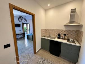 Kuchyň nebo kuchyňský kout v ubytování Torre del Pardo Guest House