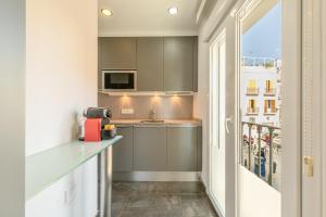 A kitchen or kitchenette at Stay U-nique Apartments Eslava