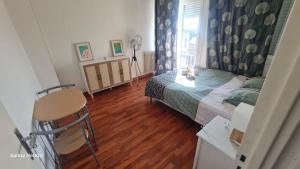 Postel nebo postele na pokoji v ubytování Appartement à 1km de la gare de Caen et 9 Kms de la plage