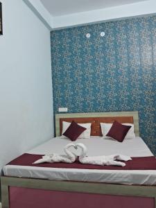 Postel nebo postele na pokoji v ubytování Ramesht Dham Resort + 6 fotografií