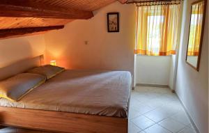 Posteľ alebo postele v izbe v ubytovaní 4 Bedroom Lovely Home In Sveti Anton