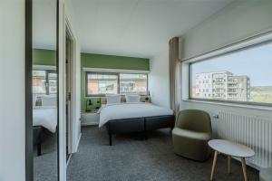 Katil atau katil-katil dalam bilik di Radisson Hotel Papirfabrikken Silkeborg