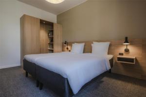 Katil atau katil-katil dalam bilik di Radisson Hotel Papirfabrikken Silkeborg