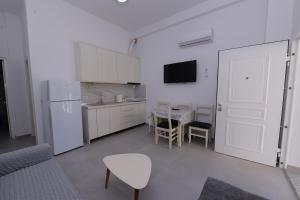 Η κουζίνα ή μικρή κουζίνα στο BeniNet Apartments in Golem Beach