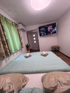 Postel nebo postele na pokoji v ubytování Apartman Josip