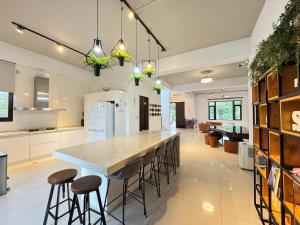 O bucătărie sau chicinetă la Annong White House