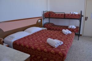 Postel nebo postele na pokoji v ubytování Hotel Artide