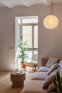 A seating area at Newly Renovated Stylish Eixample - Great Location
