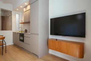 A kitchen or kitchenette at Newly Renovated Stylish Eixample - Great Location