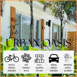 a sign in front of a white house at 3BR Oasis DT ORL, Full Kitchen & Fenced Yard! in Orlando