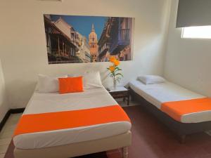 Postel nebo postele na pokoji v ubytování Hotel Toledo FL
