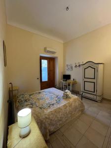Postel nebo postele na pokoji v ubytování B&b Candido Vacanze