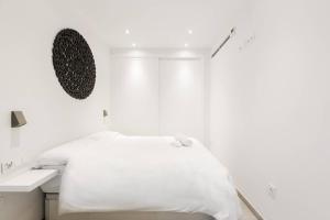 Postel nebo postele na pokoji v ubytování Minty Stay - Studio La Merced