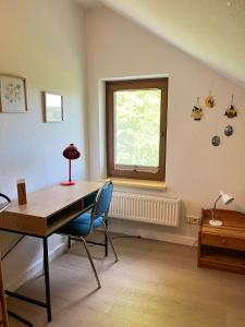 Ein Sitzbereich in der Unterkunft Ferienhäuser am Vogelpark - Boddenhaus 60