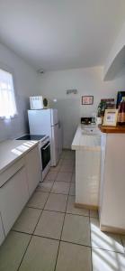 Kuchyň nebo kuchyňský kout v ubytování Gîte Paradizu, vue imprenable en Provence
