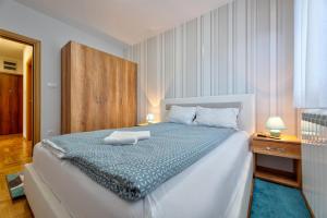 Postel nebo postele na pokoji v ubytování Apartment Mat 1