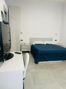 Postel nebo postele na pokoji v ubytování Il Cortile