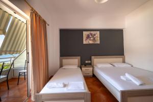 Katil atau katil-katil dalam bilik di Classic Rooms