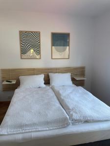 Posteľ alebo postele v izbe v ubytovaní Apartamenty Studio